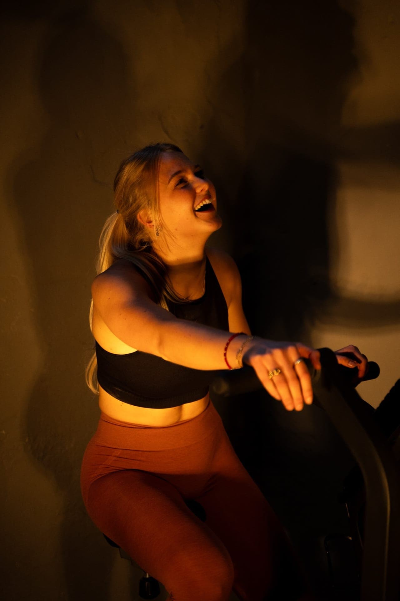 High-energy assault bike training at SculptClub